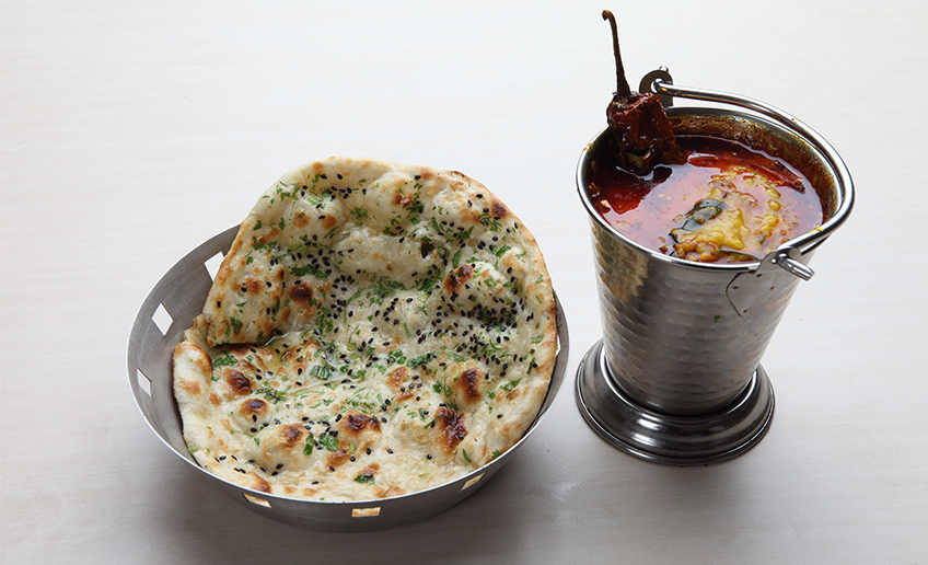 Garlic roti and dal tadka at Garam Masala